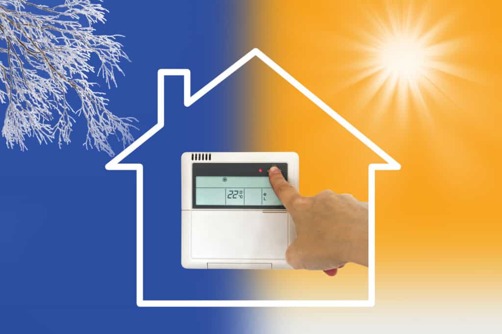 Visuel d'un thermostat de thermopompe en mode chauffage d'hiver, entouré d'un dessin de maison, sur fond bleu et jaune.